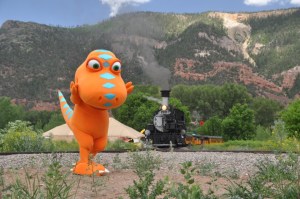A T-rex and train walk into a bar... (Copyright Durango & Silverton Narrow Gauge Railroad.)